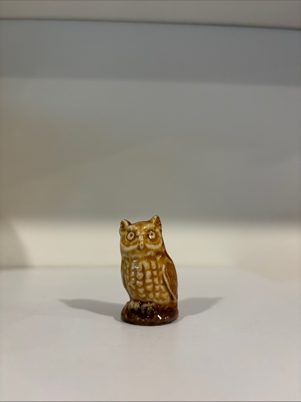 Tiny owl ceramic figurine